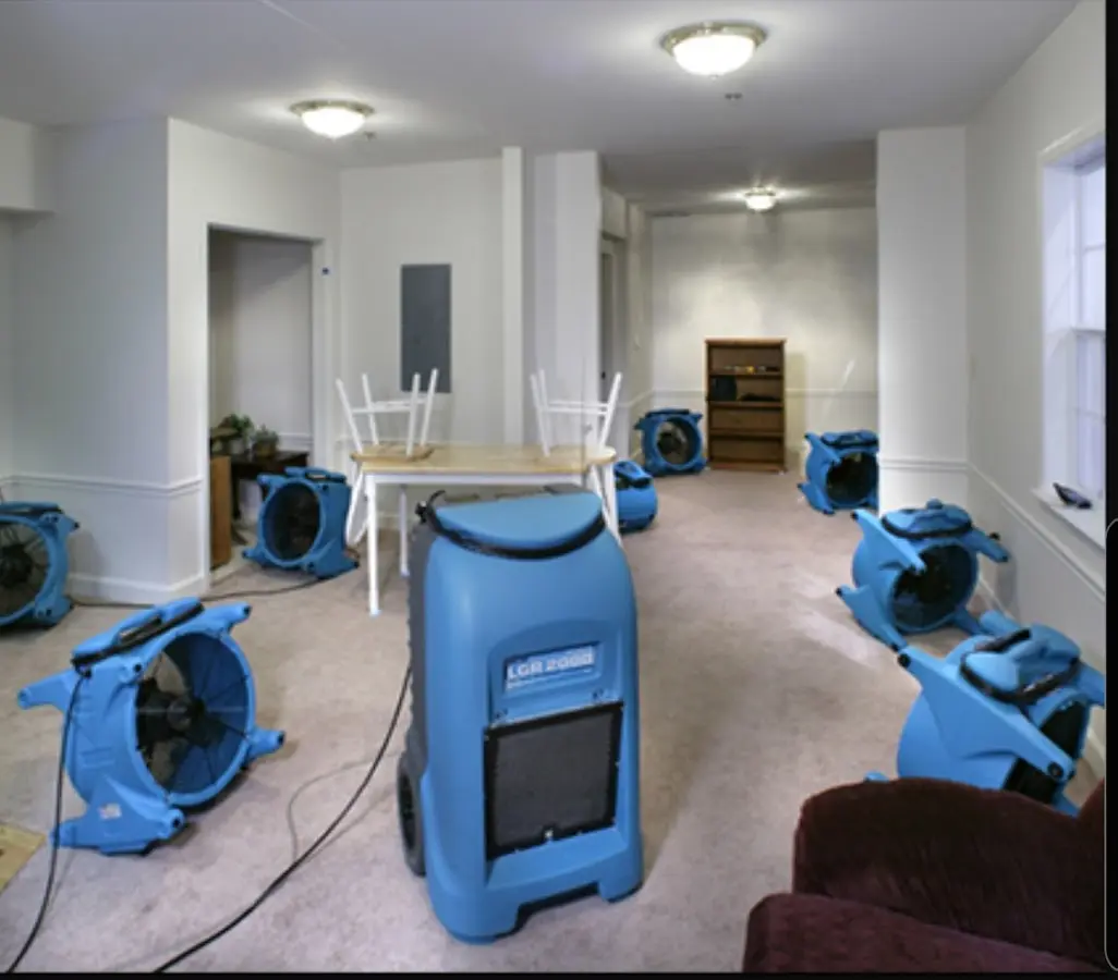 Air movers and dehumidifier setup for Water Damage Restoration in Estherville